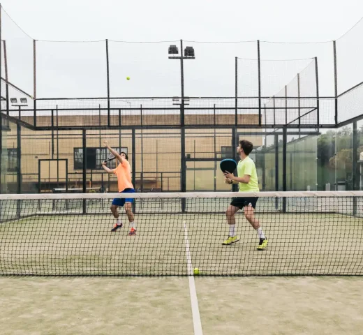 two-young-man-playing-paddle-tennis-2024-02-08-19-45-12-utc (1)